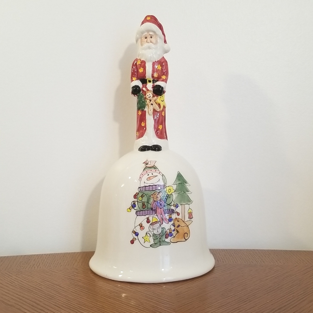 Christmas bell lg. 10 1/4" tall. 5" at opening. Some crinkle under glaze.